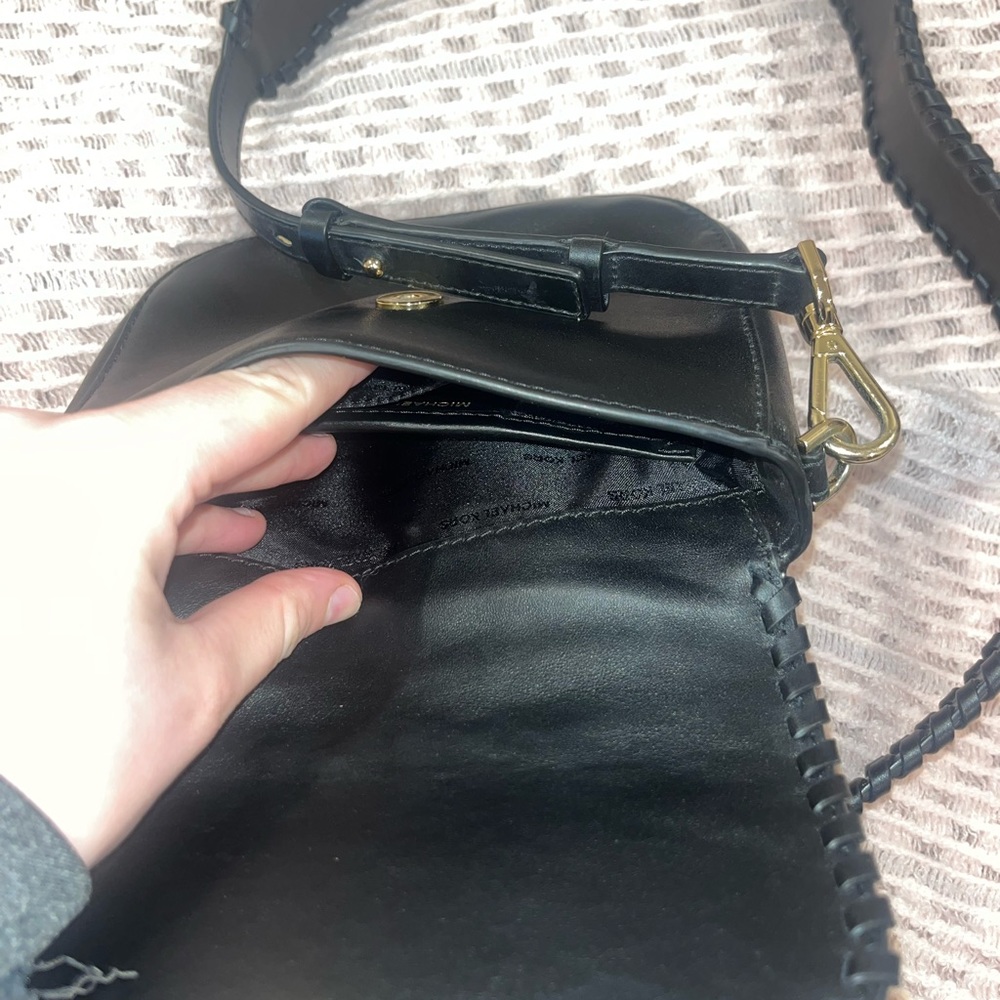 MK black leather strap purse